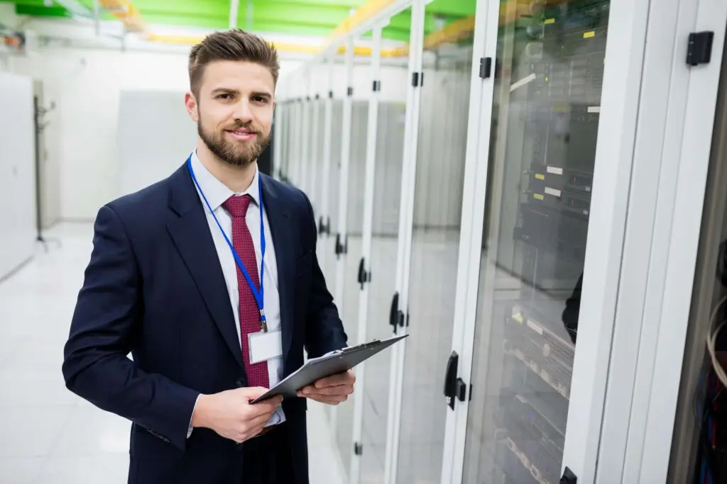 technician holding clipboard min 1